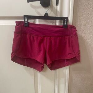 Lululemon speed ups size 4 color is maroon slightly less bright than picture